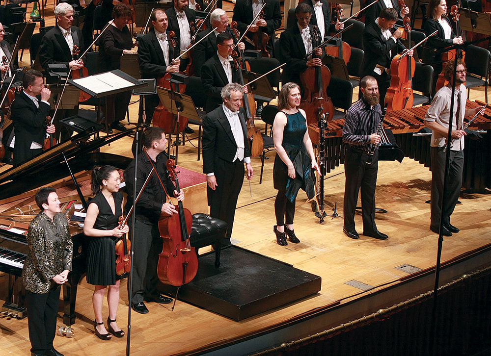 Louis Langrée with composer Jennifer Higdon (left) and members of Eighth Blackbird, after their performance of Higdon’s On a Wire.