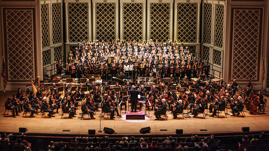 CSO and Classical Roots Choir performing on stage during a concert